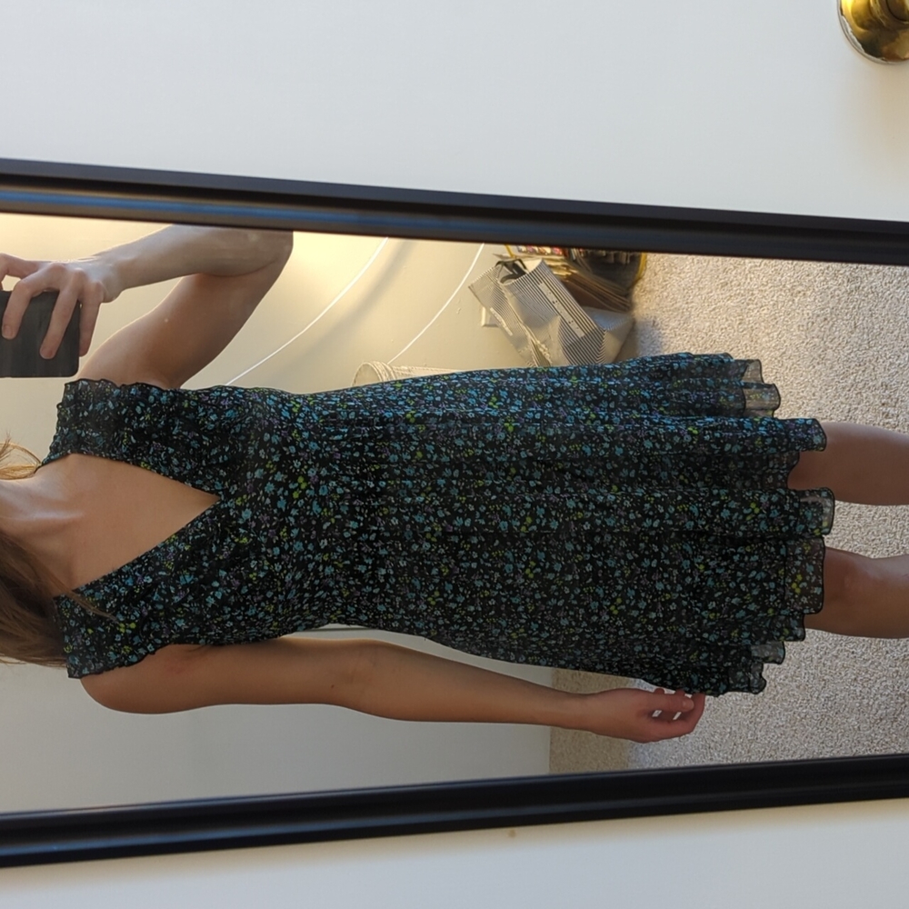 Floral dress with ruffles around collar!  Knee-length, semi-formal